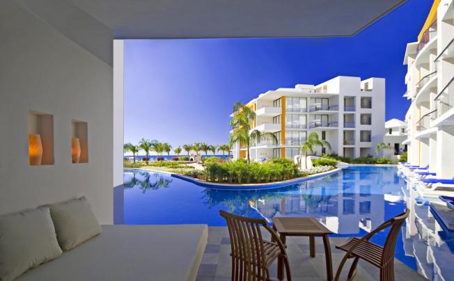 Фото отеля Secrets Aura Cozumel