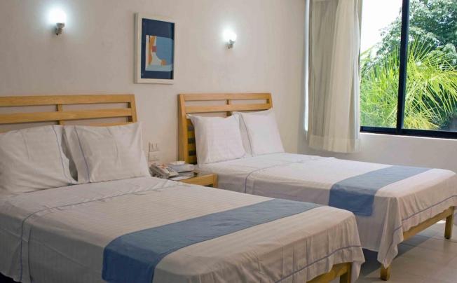Фото отеля Sotavento Hotel & Yacht Club