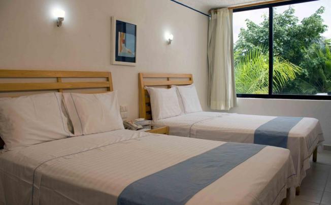 Фото отеля Sotavento Hotel & Yacht Club