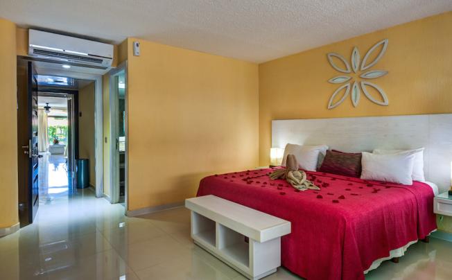 Фото отеля Suites Corazon Hotel