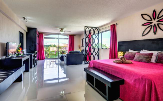 Фото отеля Suites Corazon Hotel
