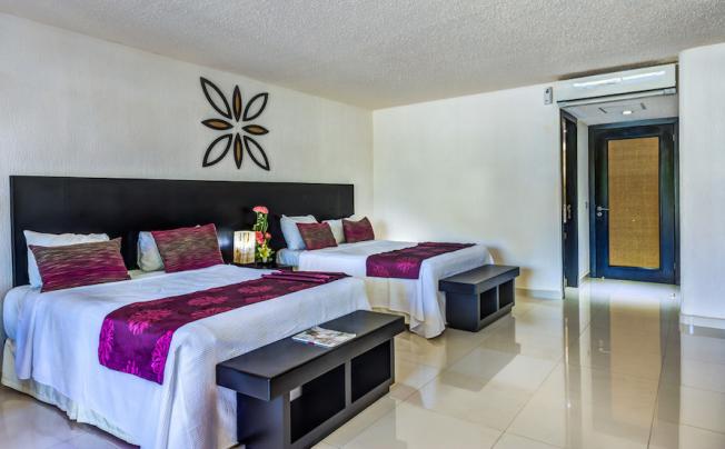Фото отеля Suites Corazon Hotel