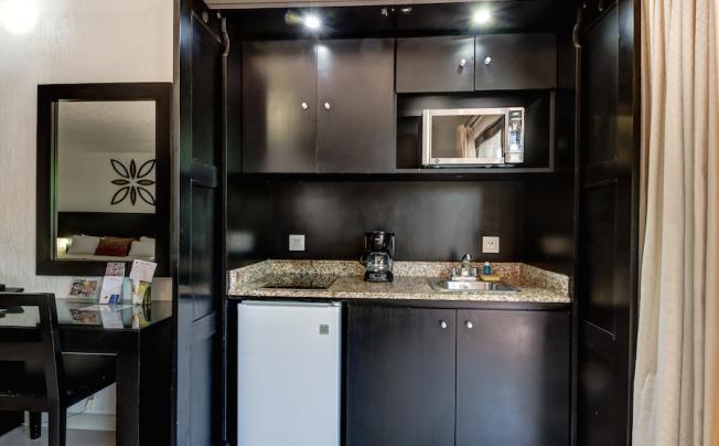 Фото отеля Suites Corazon Hotel