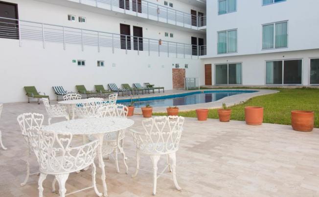 Фото отеля Playa Encantada Hotel B&b