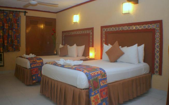 Фото отеля SUITES CANCUN CENTER