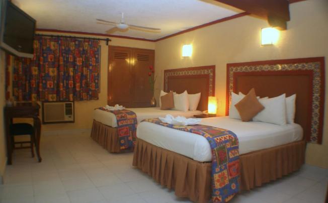 Фото отеля SUITES CANCUN CENTER