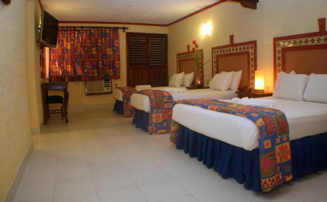 Фото отеля SUITES CANCUN CENTER