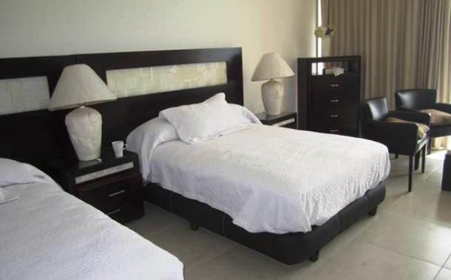 Фото отеля Carisa Y Palma Condominios