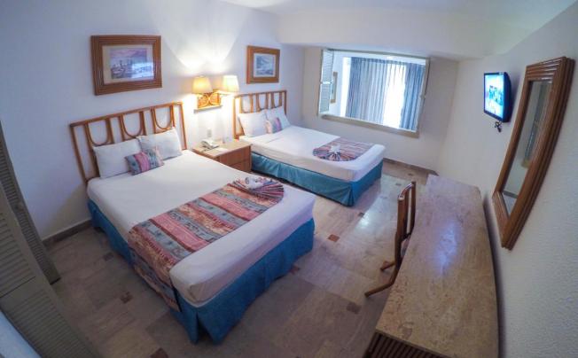 Фото отеля PLAYA SUITES ACAPULCO