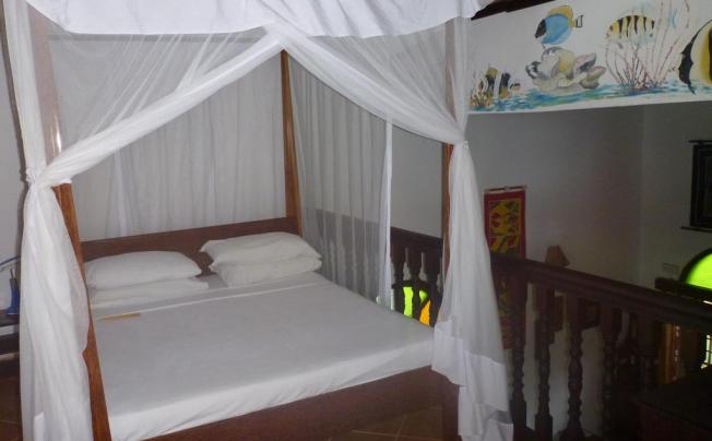Фото отеля Mnarani Beach Cottages