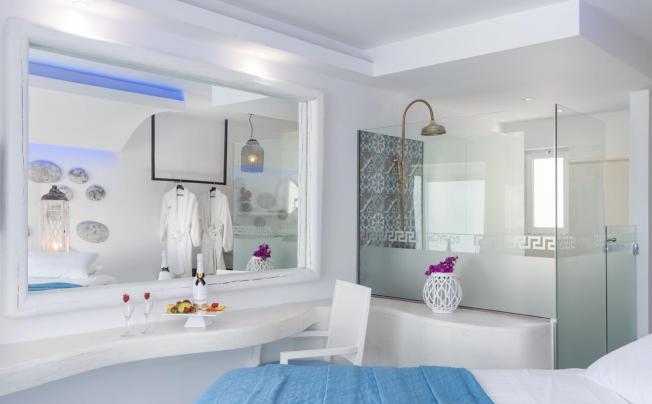 Фото отеля Kouros Home & Suites