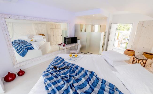 Фото отеля Kouros Home & Suites