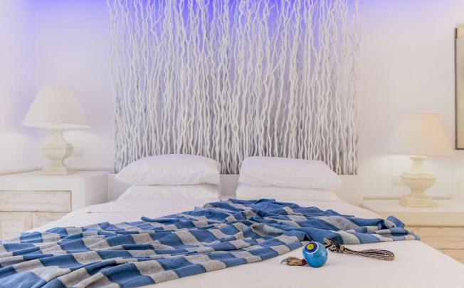 Фото отеля Kouros Home & Suites