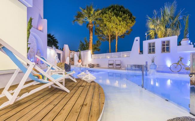 Фото отеля Kouros Home & Suites