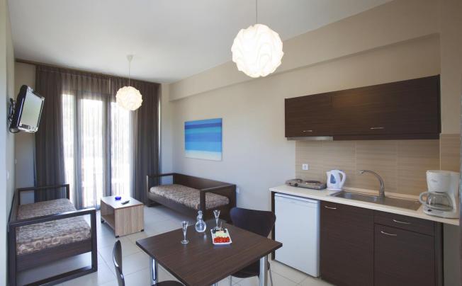 Фото отеля LA STELLA APARTMENTS & SUITES