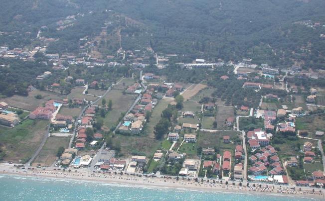 Фото отеля Salvanos Beachfront Apartments