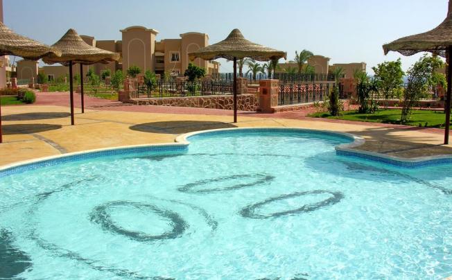 Фото отеля Pyramisa Sunset Pearl Golf & Beach Apartment