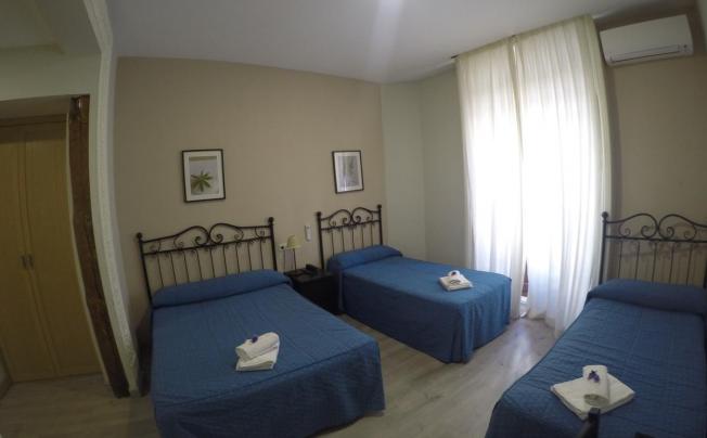 Фото отеля El Pilar Hostal