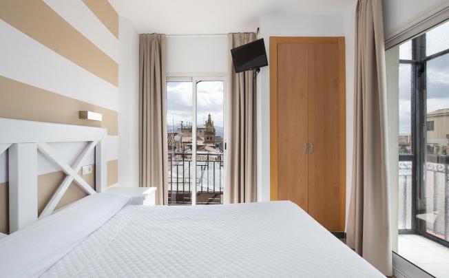 Фото отеля Atenas Hostal