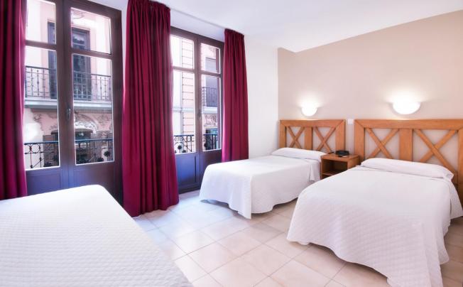 Фото отеля Atenas Hostal
