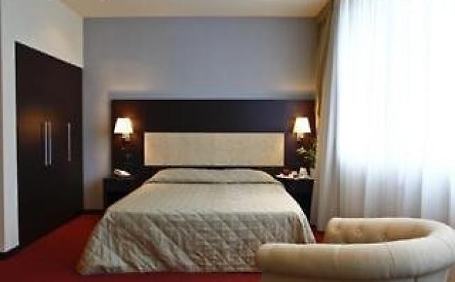 Фото отеля Tuscany Inn