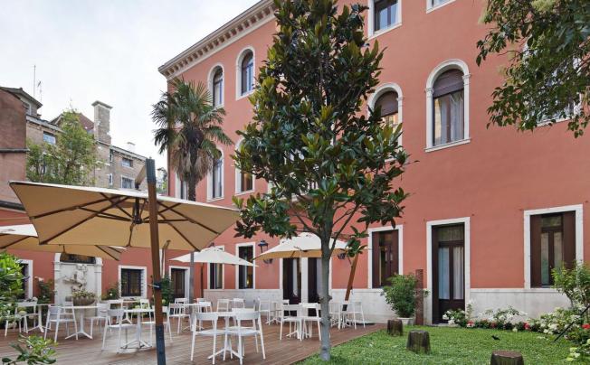 Фото отеля Nh palazzo barocci