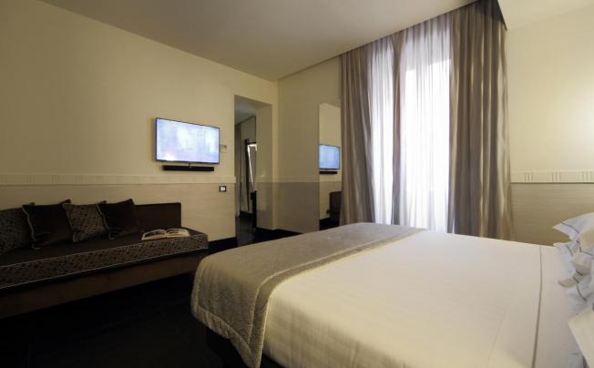 Фото отеля Mood Suites Tritone