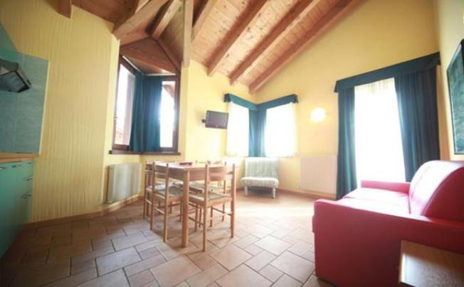 Фото отеля Chalets La Golp - La Pineta Apartments