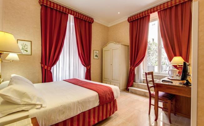 Фото отеля Ecce Roma Suites