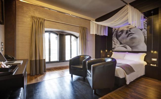 Фото отеля Dharma Hotel & Luxury Suites