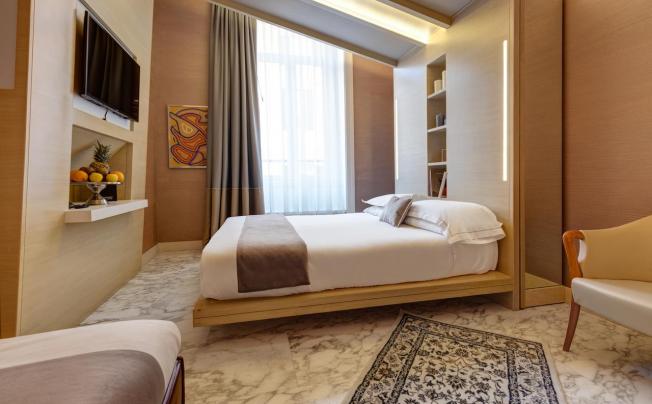 Фото отеля Dharma Hotel & Luxury Suites