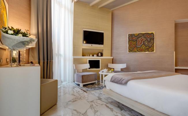 Фото отеля Dharma Hotel & Luxury Suites