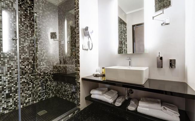 Фото отеля Dharma Hotel & Luxury Suites
