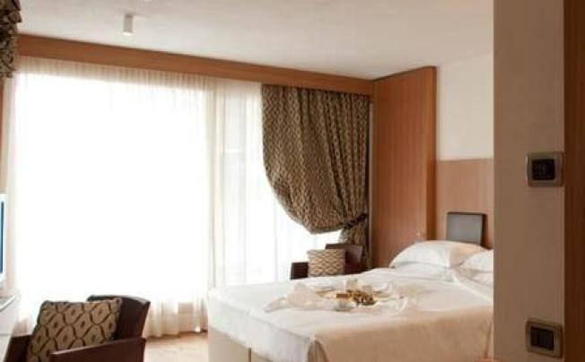 Фото отеля Alaska Hotel Cortina