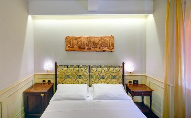 Фото отеля ART HOTEL COMMERCIANTI 