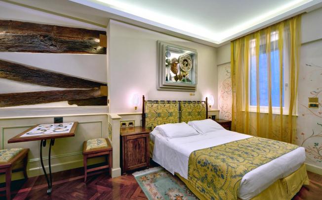Фото отеля ART HOTEL COMMERCIANTI 