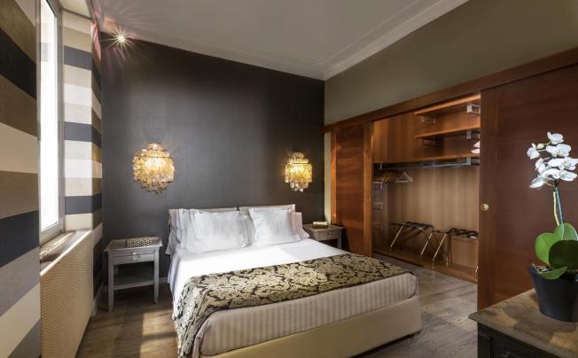 Фото отеля Manfredi Apartments - Marco Aurelio Suite
