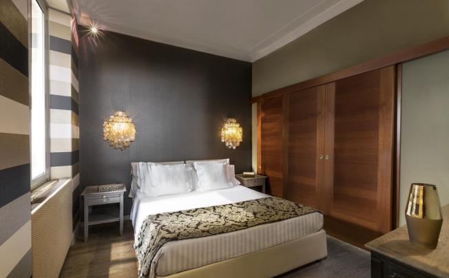 Фото отеля Manfredi Apartments - Marco Aurelio Suite