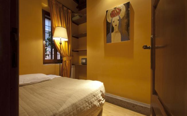 Фото отеля Manfredi Apartments - Marco Aurelio Suite