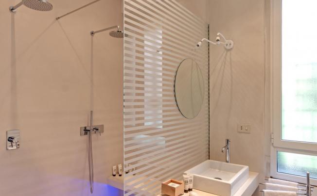 Фото отеля Manfredi Apartments - Marco Aurelio Suite