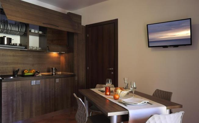 Фото отеля AI POZZI VILLAGE SPA RESORT