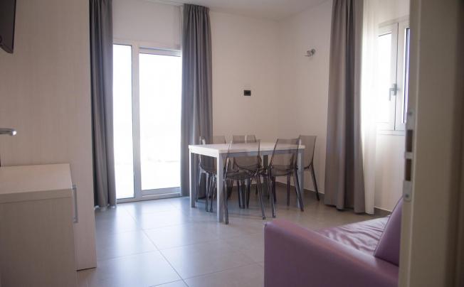 Фото отеля Residence albachiara apartment