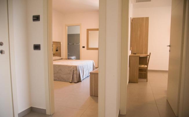 Фото отеля Residence albachiara apartment
