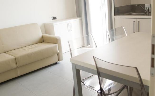 Фото отеля Residence albachiara apartment