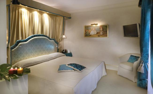 Фото отеля A La Commedia Hotel