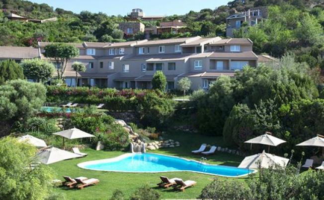 Фото отеля Spazio Oasi Prestige Chia Laguna Resort