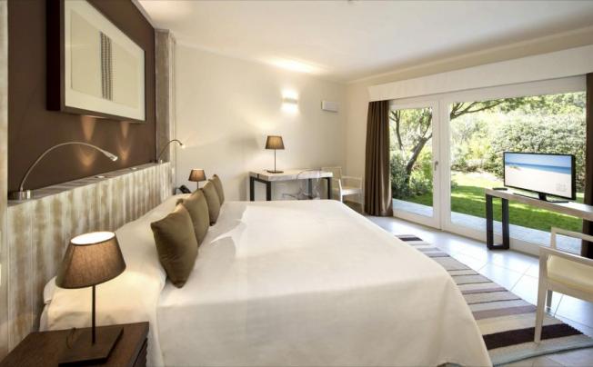 Фото отеля Spazio Oasi Prestige Chia Laguna Resort