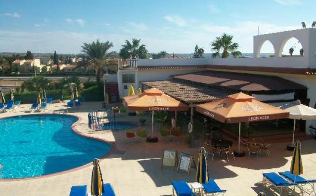 Фото отеля Cosmelenia Hotel Apartments