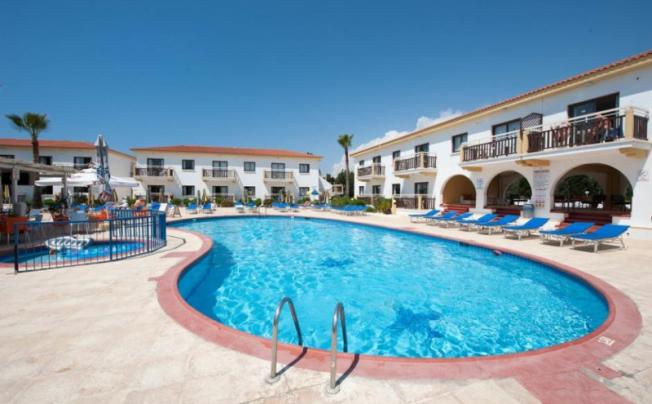 Фото отеля Cosmelenia Hotel Apartments