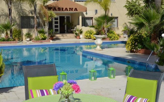 Фото отеля Tasiana Hotel Apartments